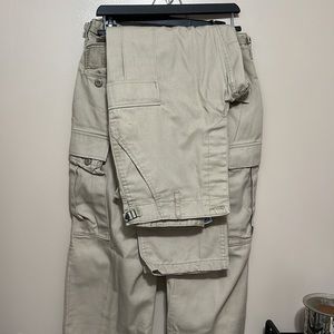 2 pair men’s Cargo pants by Propper w/  adjustsble waist See photo for sizes